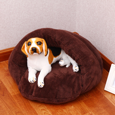 Small and medium sized dog and dog bed dog.