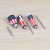 The American flag reflexed and used to adjust the screwdriver cross one word for vanadu steel head screws.