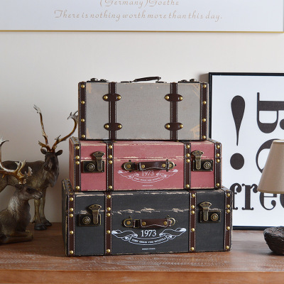 A vintage three-piece set with A suitcase.