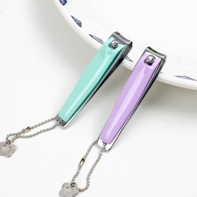 Minli bag of simple drops of oil flash powder nail clippers curved stainless steel belt key chain nail tools wholesale.