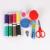 Sewing needle and thread suit scissors measuring tape.