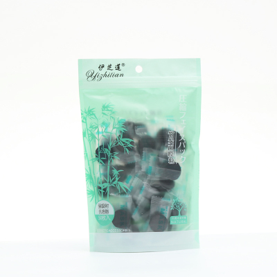 Yi zhi lotus genuine black charcoal bamboo wood compression mask paper absorbs black water to moisturize 30 grains.