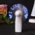 The gift is hand-held flash fan mini battery small fan manufacturer direct sale.