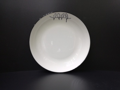 Ceramic bone China 8-inch fruit plate bird design black edge.