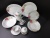 Daily ceramic high-temperature porcelain with a round plate of 47 round cups and dishes.