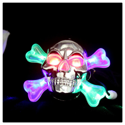 The Halloween skullcap headlamp necklace glitter party ornament.