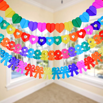 The birthday party decorated with colorful paper and decorated with colorful paper.