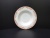 8-inch bone porcelain round flat edge soup with small film red/green.