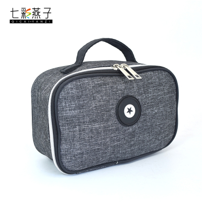 The new cationic quartet waterproof Oxford cloth large capacity to receive the handbag factory direct sale.