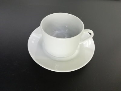 Ceramic high temperature porcelain white round cup saucer set.