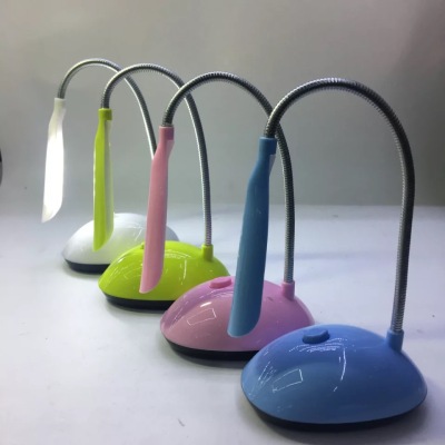 X-7188 battery small desk lamp students study eye-protection book lamp hose folding LED lamp factory direct sales.