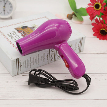 High quality electric hair dryer manufacturers direct selling low - priced air duct portable travel 1000w hair dryer.