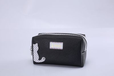 New south Korean version of the fashion handbag stamp personality cat inset with drill wave dot cosmetic bag.
