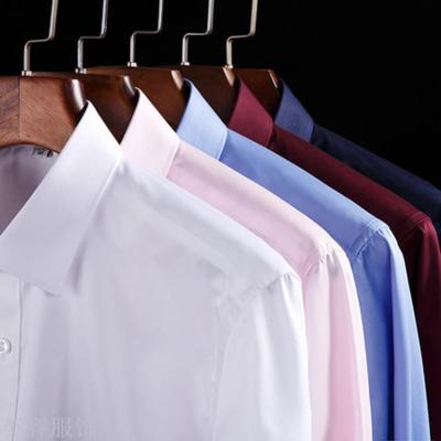 New men's business shirt men's long sleeve pure cotton Korean version of pure color stripe suits professional shirt.