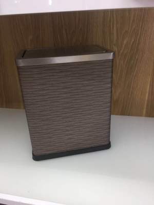 Shake lid wood grain stainless steel trash can.