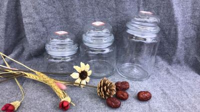 The tea can can be used to seal the glass jar.