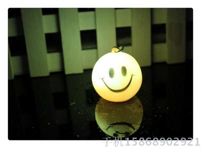 0437 light-emitting key ring with a smile key chain flash toy creative small gift wholesale.