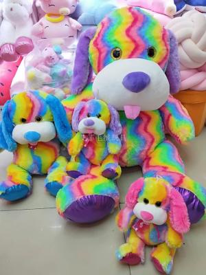 The TY rainbow dog with big eyes and long ears is a new American TY stuffed dog doll