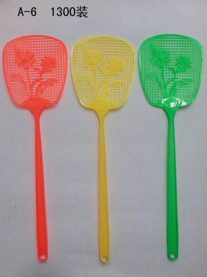 The fly swatter the long plastic swatter the mosquito swatter the fly