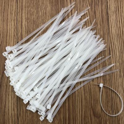 Manufacturer direct selling white self - locking plastic nylon ribbon color tie line with black tie - up tape