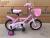 Cute children cycling with flower baskets and protection wheels for children aged 3-12