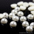 Wholesale 6.5mm abs semi-round imitation pearl plastic powder beads rice shape powder beads strong light DIY pearl jewelry
