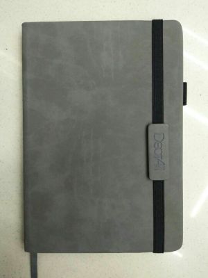 A business notebook with elastic straps