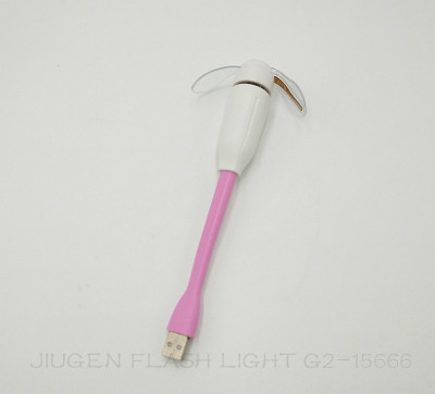 A small USB flash fan with a long flashlight