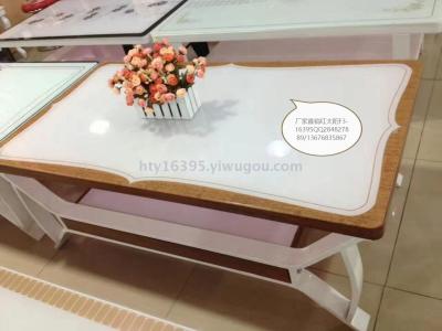 Factory direct sale of high - grade toughened hot curved glass tea table TV table glass tea table table table