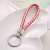 Auto creative hand-woven leather rope key chain lady key ring car pendant promotional gift