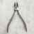Nail art tool button handle to remove dead leather pliers convenient and practical feel good xian DE li tool