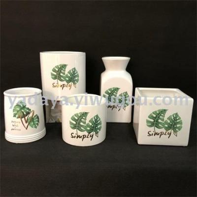 Vase arrangement eight flamingos turtle leaf letter simple