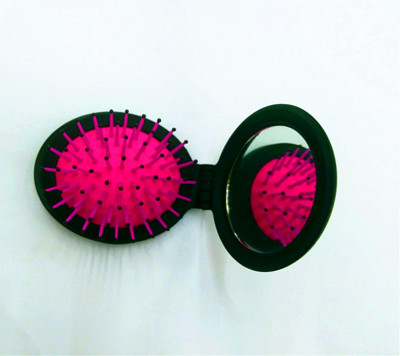 New oval folding mirror comb popular consumer goods color portable folding mirror into a set