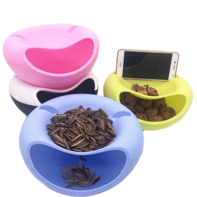 Lazy man fruit plate with mobile phone stand Lazy man fruit plate crack melon seed magic item snack plate