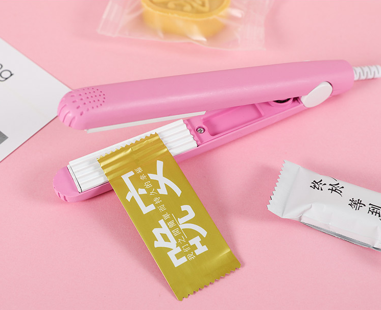 小型家用迷你便携牛轧糖封口机零食雪花酥包装袋糖纸塑封机