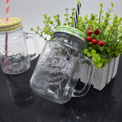 Put a glass cup in a glass bottle and a mason cup with a straw lid