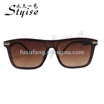 Stylish tan - colored sunglasses complement trendy sunglasses 1831