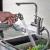 A single hole sink sink sink sink with an airbrush can turn hot and cold kitchen faucets