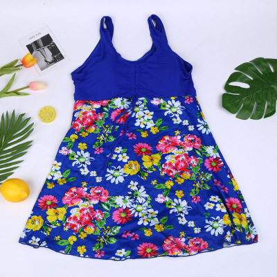 The bathing dress style is slim and keeps the stomach covered