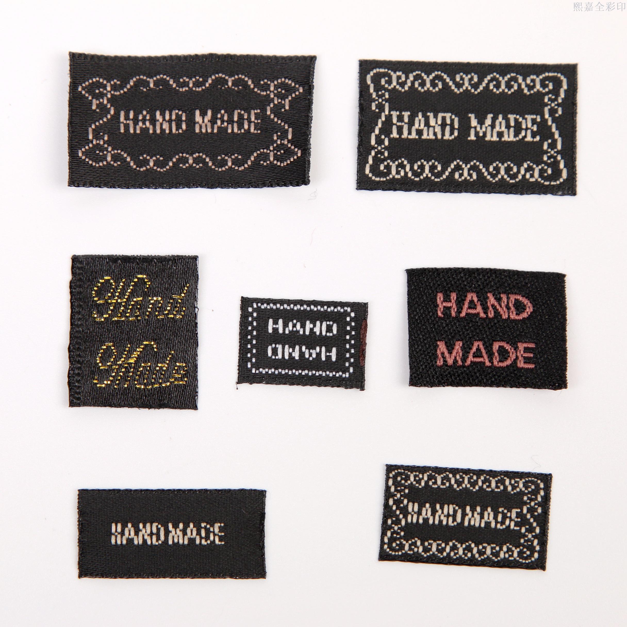 厂家批发织边缎面平面尺码标 服装辅料大小码通用码水洗标批发