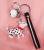 Naughty spotted dog key accessories decorative craft key chain pendant bag doll ornaments hanging ornaments