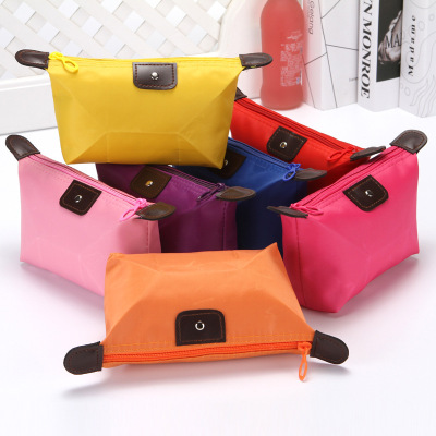 Korean version portable cosmetic bag dumpling storage bag mini cute wash bag LOGO can be printed