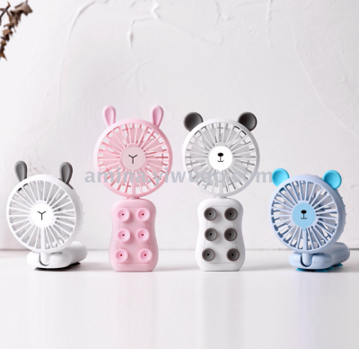 The new mobile travel fan hand-held mini fan student desktop fan charging suction fan