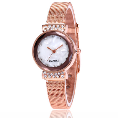 A small oblong watch for women with rose gold mesh quartz watch for women