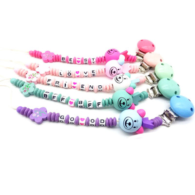 Cartoon pacifier chain infant letter chain wooden color molars teeth off the pacifier chain letter pacifier chain