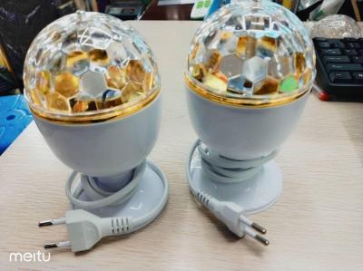 New LED seven-color rotating laser stage light rotating seven-color crystal bulb magic ball KTV flash lamp