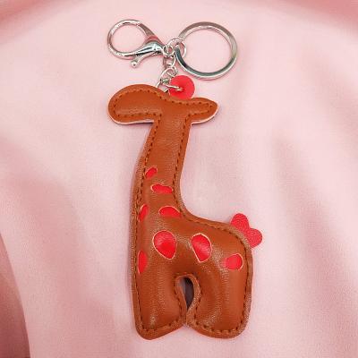 Cute giraffe PU decorative arts automotive supplies quality male bag key chain ornaments hanging ornaments