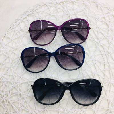 These are Women's large frame sunglasses with two shades