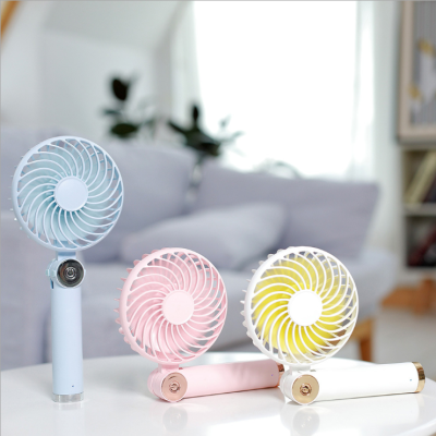 Rotary folding small fan USB charging handheld mini desktop small fan with charging pad function