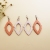 Spotted double-sided oil edge leather hollow out oval drop leaf PU jewelry
